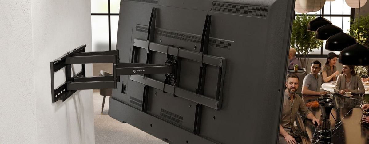 Heavy TVs on an ONKRON wall mount and rolling TV stand.